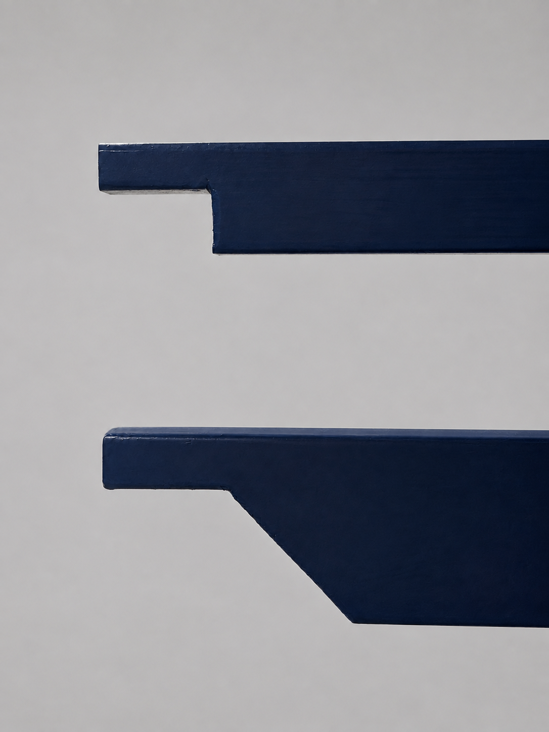 Two navy ProHorse plank end profiles against a grey background — the upper is a standard cup end, the lower is a diagonal step end